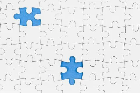 Jigsaw puzzle with one piece missing Stock Photos