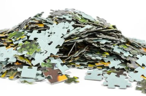 Jigsaw puzzles scattered randomly prepared for assembly Stock Photos