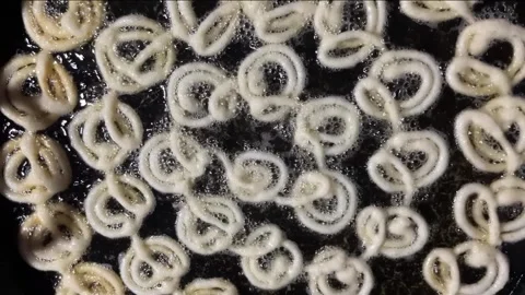 Jilapi being made at the fair Stock Footage 313503953