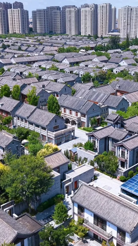 Jimo Ancient City Aerial: Traditional Homes Contrasting Modern Skyscrapers Video stock 330797341