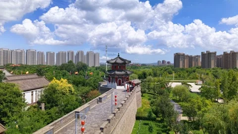 Jimo Ancient City Wall and Pavilion Overlooking Qingdao Cityscape Stock Footage 330796410