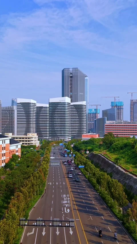 Jinan CBD: Dynamic Cityscape with Modern Skyscrapers &amp; Traffic Stock Footage 331228686