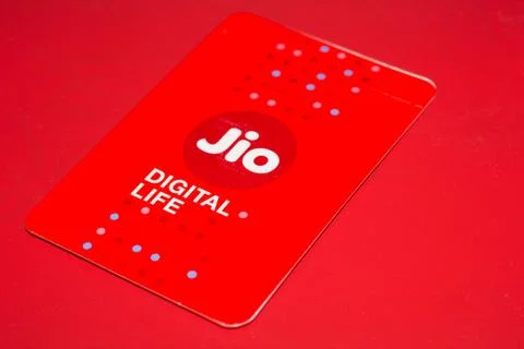 Jio SIM Cards With Every JioFi or 4G Smartphone with Green Background for text Stock Photos