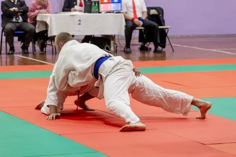 Jiu-Jitsu wrestling competition among men. Martial arts and fighting sports. Stock Photos