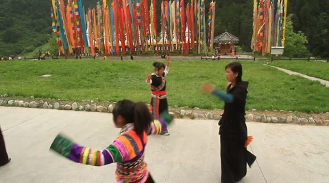 Jiuzhaigou dancers 4 Stock Footage 5504014