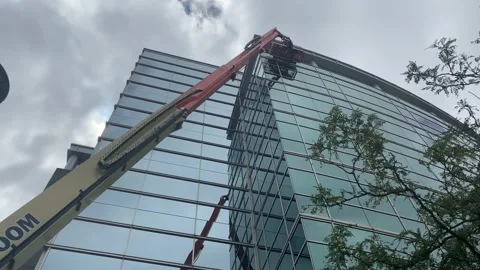 JLG - Ultra Boom - Construction - Window Repair Stock Footage 203801719