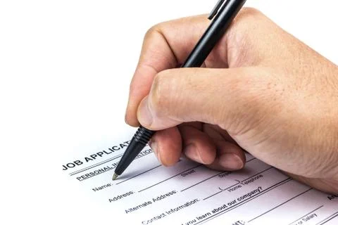 Job application with hand Stock Photos
