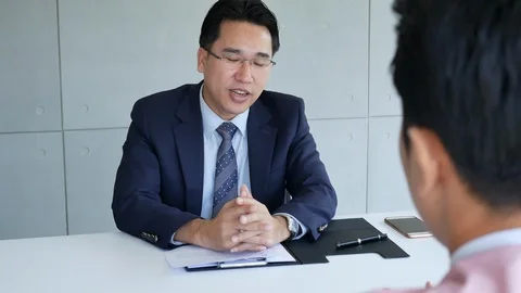 Job HR applicants having an interview with Human resource manager jobs interview Stock Footage 122412008