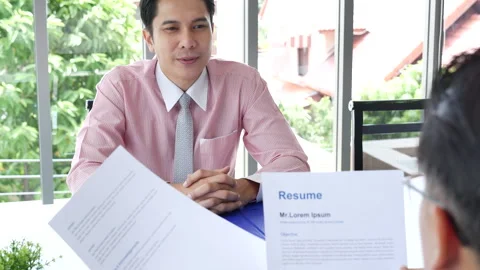 Job Interview with headhunter agent and applicant. Job HR applicants Stock Footage 276676572