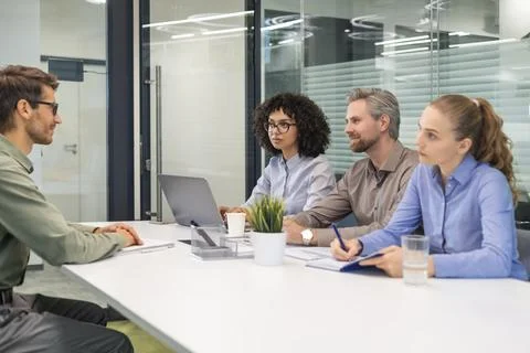 Job interview. HR asking potential candidate about skills Stock Photos