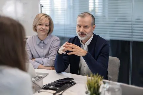 Job interview. HR asking potential candidate about skills. Stock Photos
