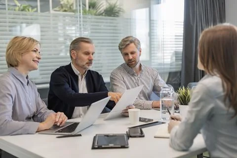 Job interview. HR asking potential candidate about skills. Stock Photos
