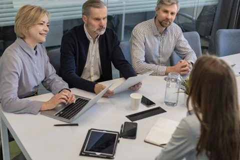 Job interview. HR asking potential candidate about skills. Stock Photos