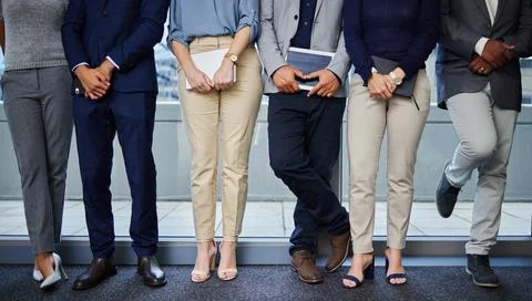 Job interview, queue or legs of people waiting for recruitment, business or Stock Photos