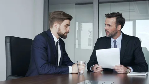 Job interview   recruiter talking with candidate Stock Footage 73671445