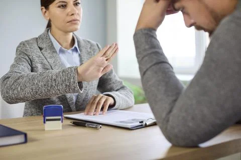 Job interview rejection during documents and resume review on meeting in office Stock Photos