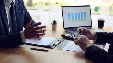 Job interviewer or manager is explaining about working in the company for new Stock Footage 128293375