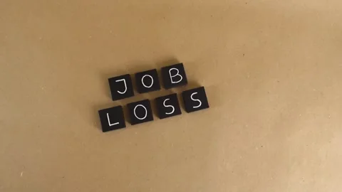 Job loss concept featuring black letter tiles Stock Footage 341861613