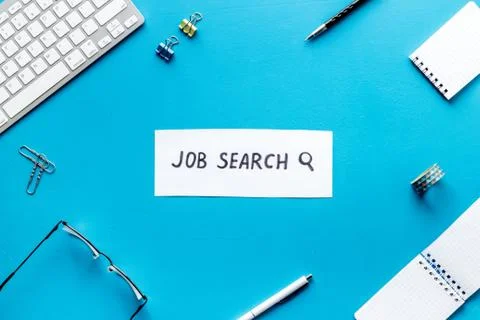 Job search. Flat lay, blue office desk top-down Stock Photos
