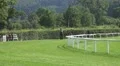 Jockey with truculent racing horse enters the course HD Footage