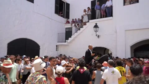 The 'Jocs des Pla' closes the Sant Joan festivities in Ciutadella, Ciutadella (M Stock Footage 337651767
