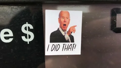 Joe Biden I did that sticker on gas pump Stock-Footage 205077372