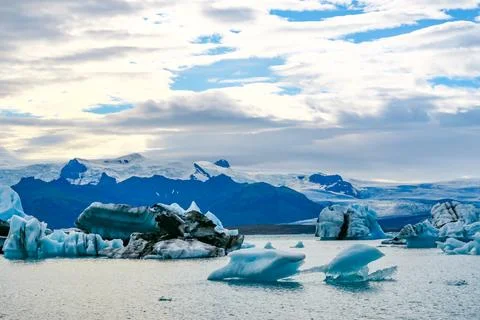 Joekulsar lagoon with icebergs  and eroding glacier in Iceland Stock Photos