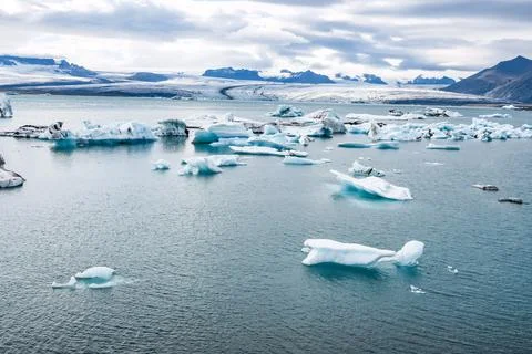 Joekulsar lagoon with icebergs  and eroding glacier in Iceland Stock Photos