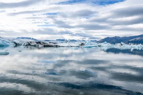 Joekulsar lagoon with icebergs  and eroding glacier in Iceland Stock Photos