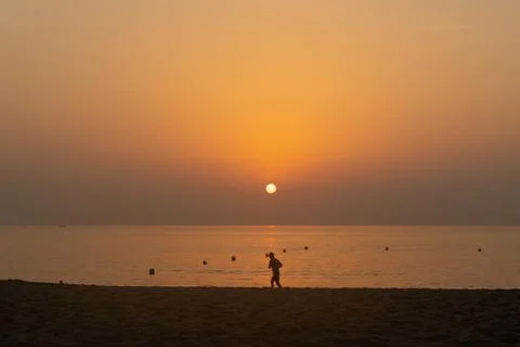 Jogger on the beach Stock Photos