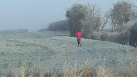 Jogger on A Freezing Winters Day Stock Footage 102177689