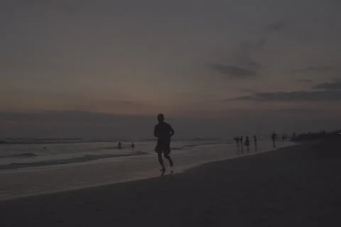 Jogger Running Along Beach Stock-Footage 246410550