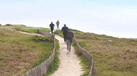 A jogger in sequential views appears in multiple static poses Stock Footage 49387755