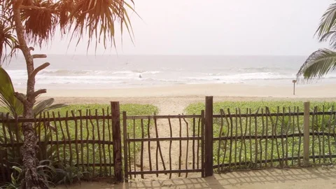 Jogger on a Tropical Beach in Hikkaduwa, Sri Lanka Stock Footage