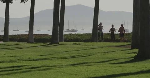 Joggers on Broadwalk 4k Stock Footage 69149101