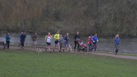 Joggers on a park run Stock Footage 160984588
