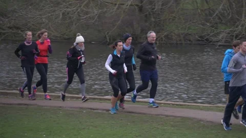 Joggers on a park run Stock Footage 160984601