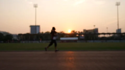 Joggers running outdoors in Bangkok Stock Footage 102843553