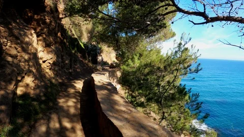 Jogging along the coastal cliffs. View from the runner perspective. Picturesque Stock Footage 123122950