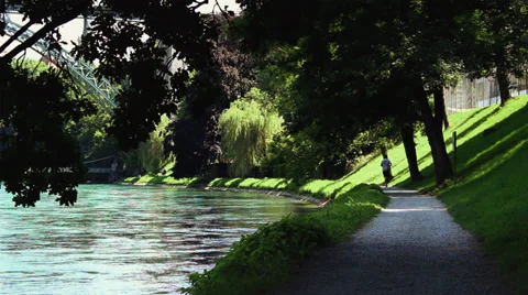 Jogging along the Riverbank Video stock 32404117