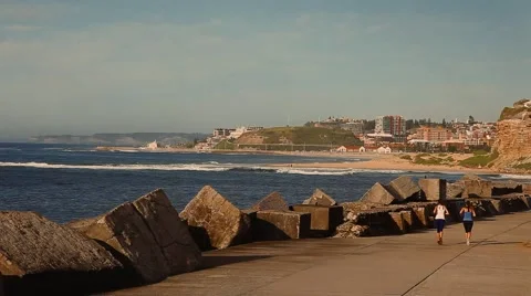 Jogging along the shore Stock Footage 42482717