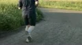 Jogging and riding on bike in the park HD Footage