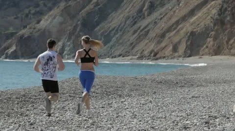 Jogging on the beach. Stock Footage 22156565
