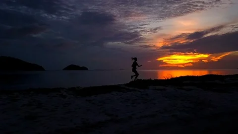Jogging on the beach Stock Footage 89019921