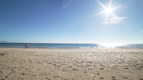 Jogging on the beach Stock Footage 89684627