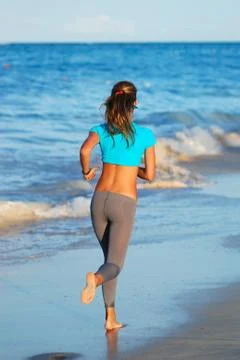 Jogging at beach Foto stock