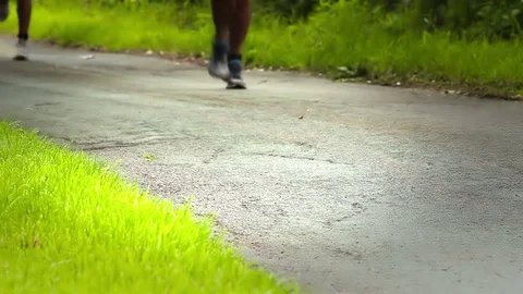 Jogging in the British countryside in the summertime. Stock Footage 72132402