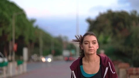 Jogging in the city at sunset Stock Footage 125051344