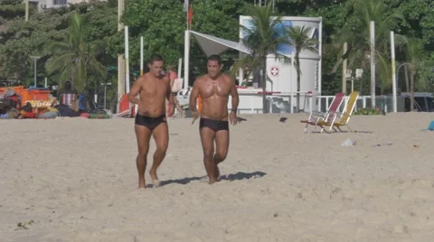 Jogging on Copacabana Beach Stock Footage 56946917