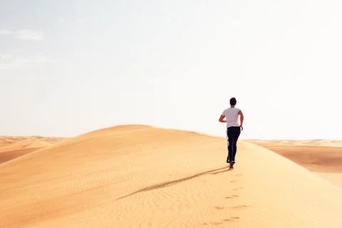 Jogging In The Desert 写真素材